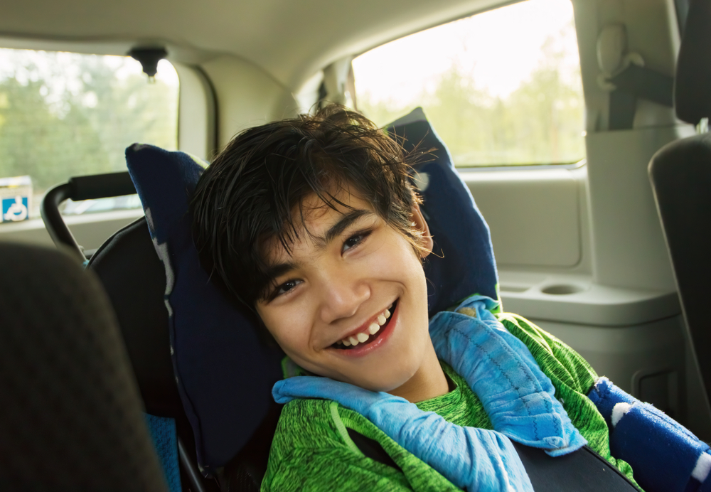 Adaptive Vans Child Smiling Conversion Van